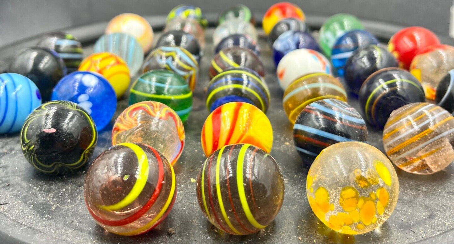 A good collection of 37 early glass marbles Diameter 25mm