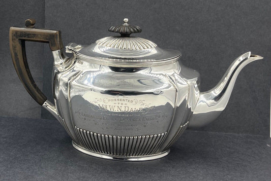 A presentation silver teapot of Lancaster railway interest Sheffield 1897