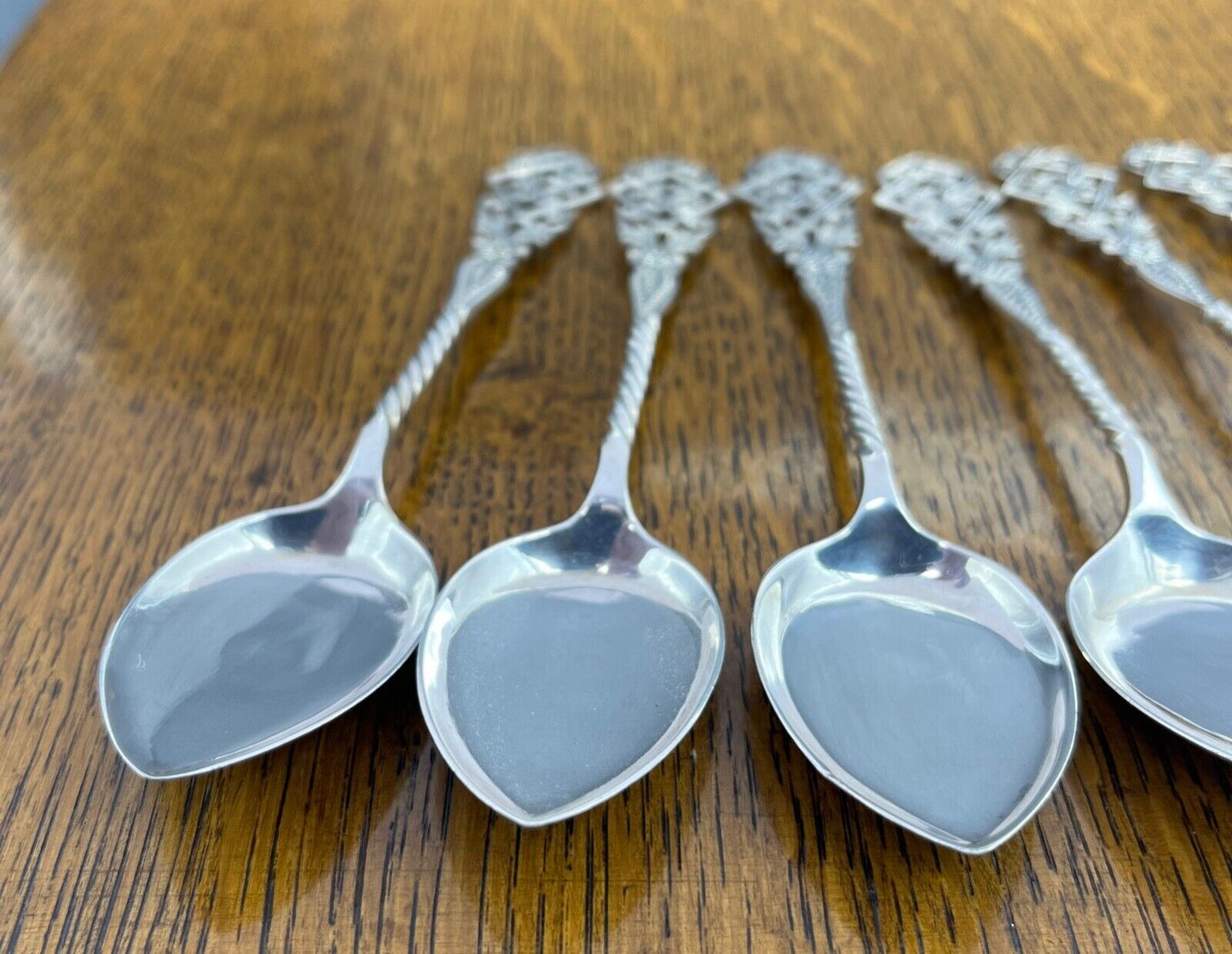 A fine set of 6 pierced sterling silver ice cream spoons Sheffield 1900