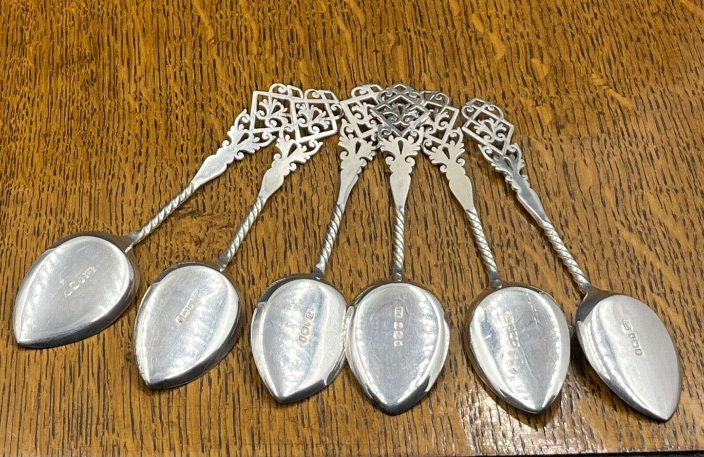 A fine set of 6 pierced sterling silver ice cream spoons Sheffield 1900