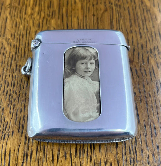 An English sterling silver vesta case with photograph frame Birmingham 1900